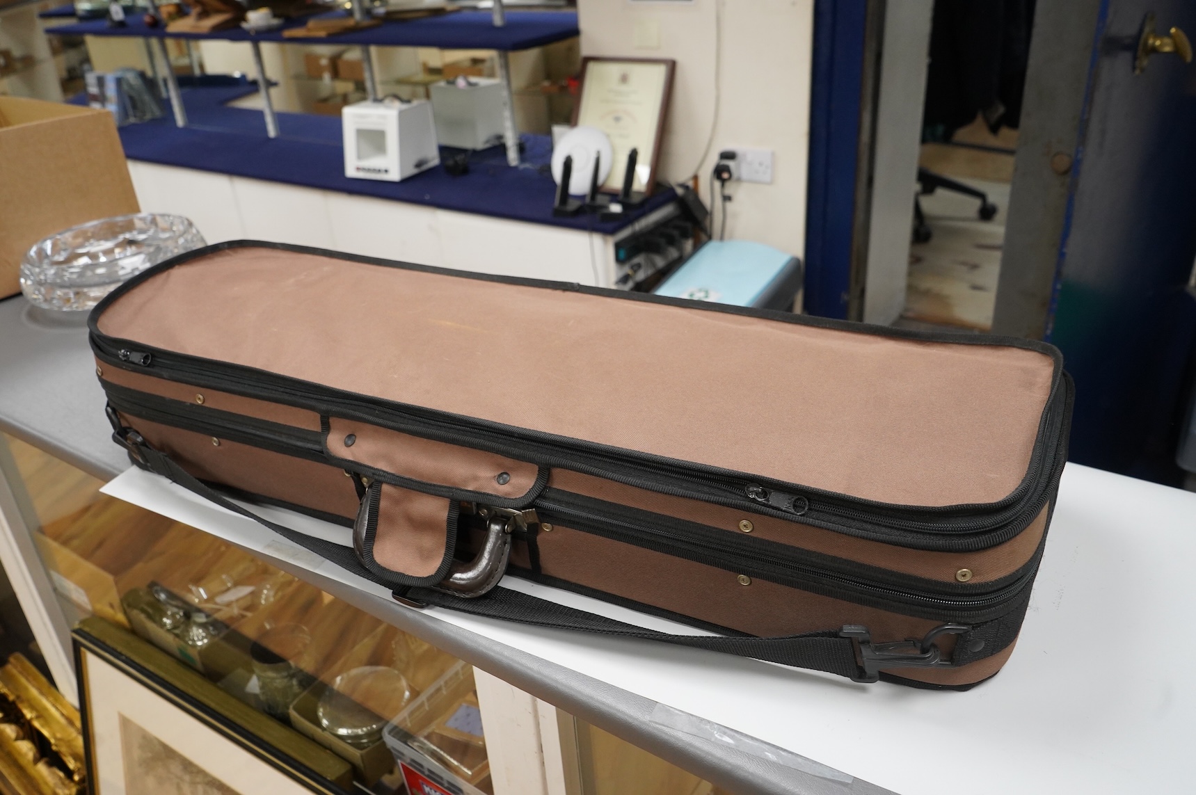 A cased late 19th century German viola, the body 15 3/4”, bearing a label reading Max Lutz 1939